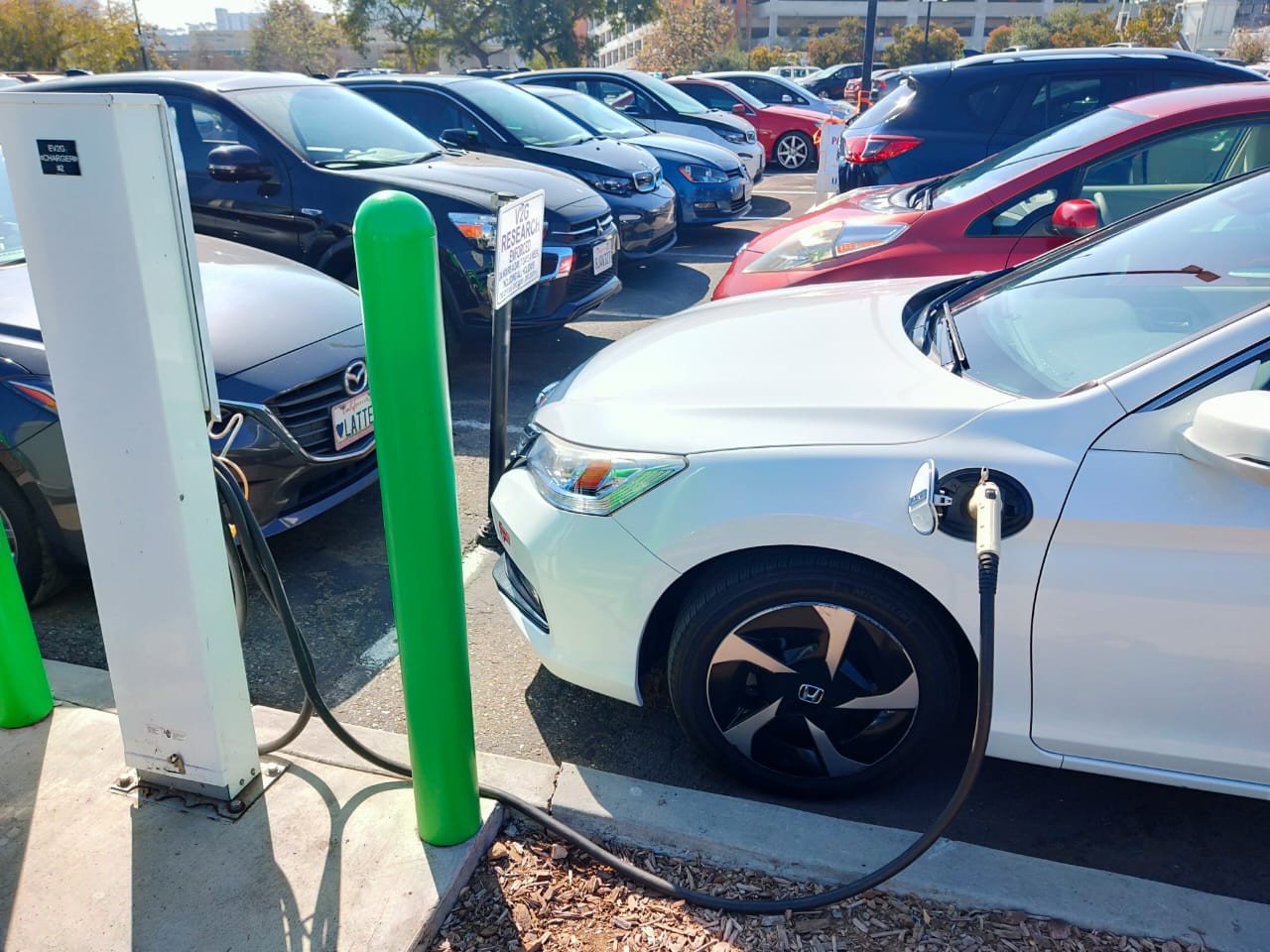 A photo of electric vehicle getting charged